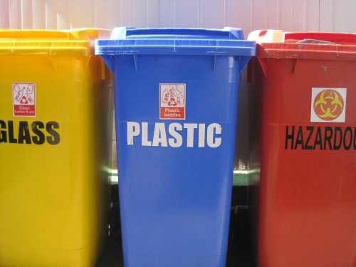 Yellow, Blue, and Red Recycling Bins